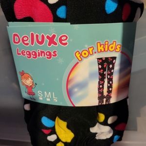 Deluxe Leggings Girl sz Large fleece, black with paw prints NWT